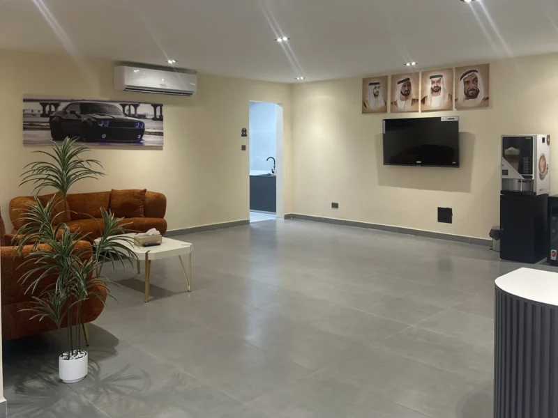 Customer lounge at KMP — seating, TV and coffee while you wait